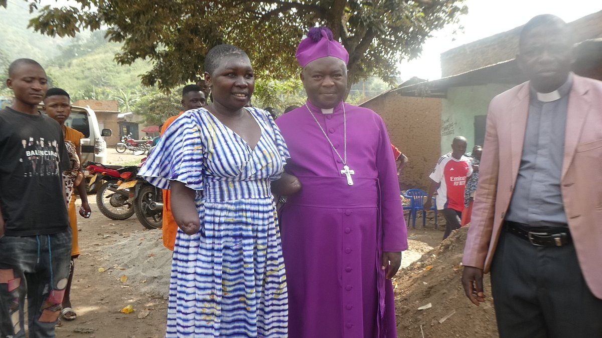 SrdSouth's tweet image. Restored hope: Bishop Nason Baluku opens up a general merchandise shop for Esther Mbambu, 36 years from Maliba Sub County, Busongora County North in Kasese district whose hands were amputated by her husband in a domestic brawl. Visit: southrwenzorid.org for more