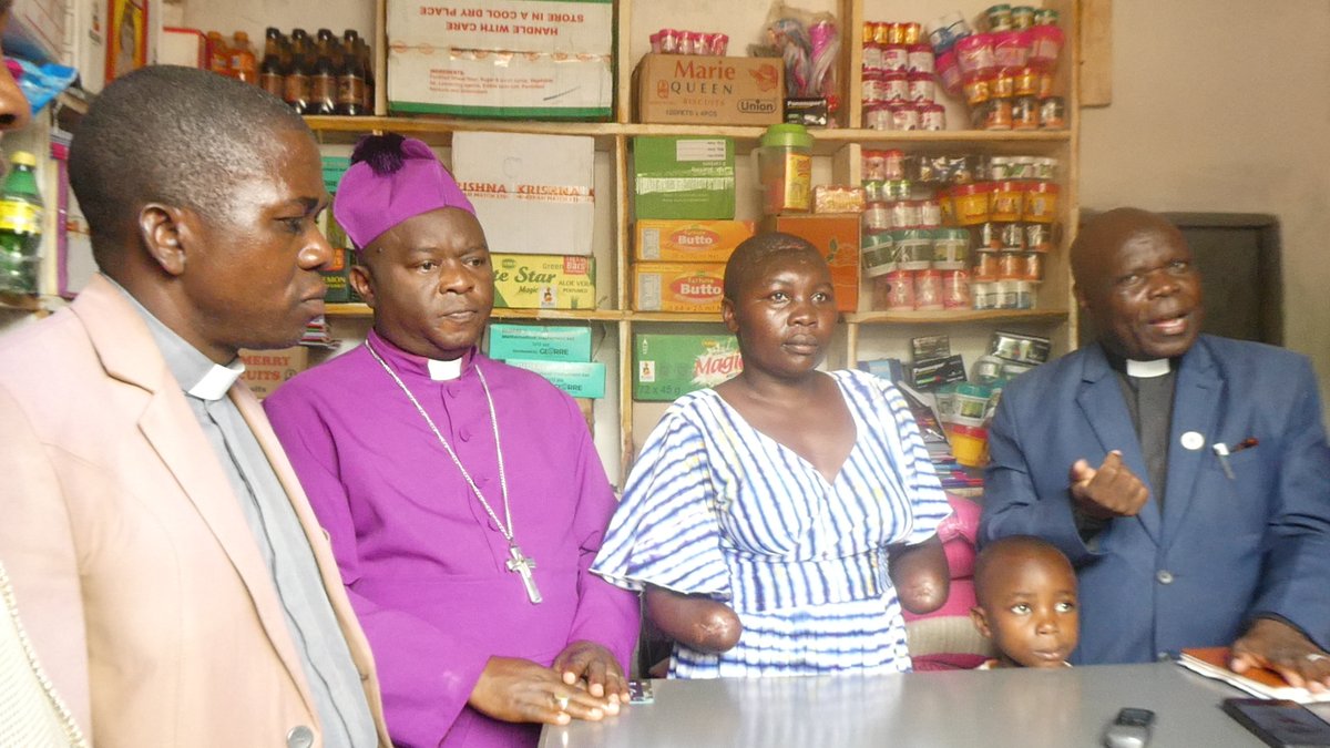 SrdSouth's tweet image. Restored hope: Bishop Nason Baluku opens up a general merchandise shop for Esther Mbambu, 36 years from Maliba Sub County, Busongora County North in Kasese district whose hands were amputated by her husband in a domestic brawl. Visit: southrwenzorid.org for more