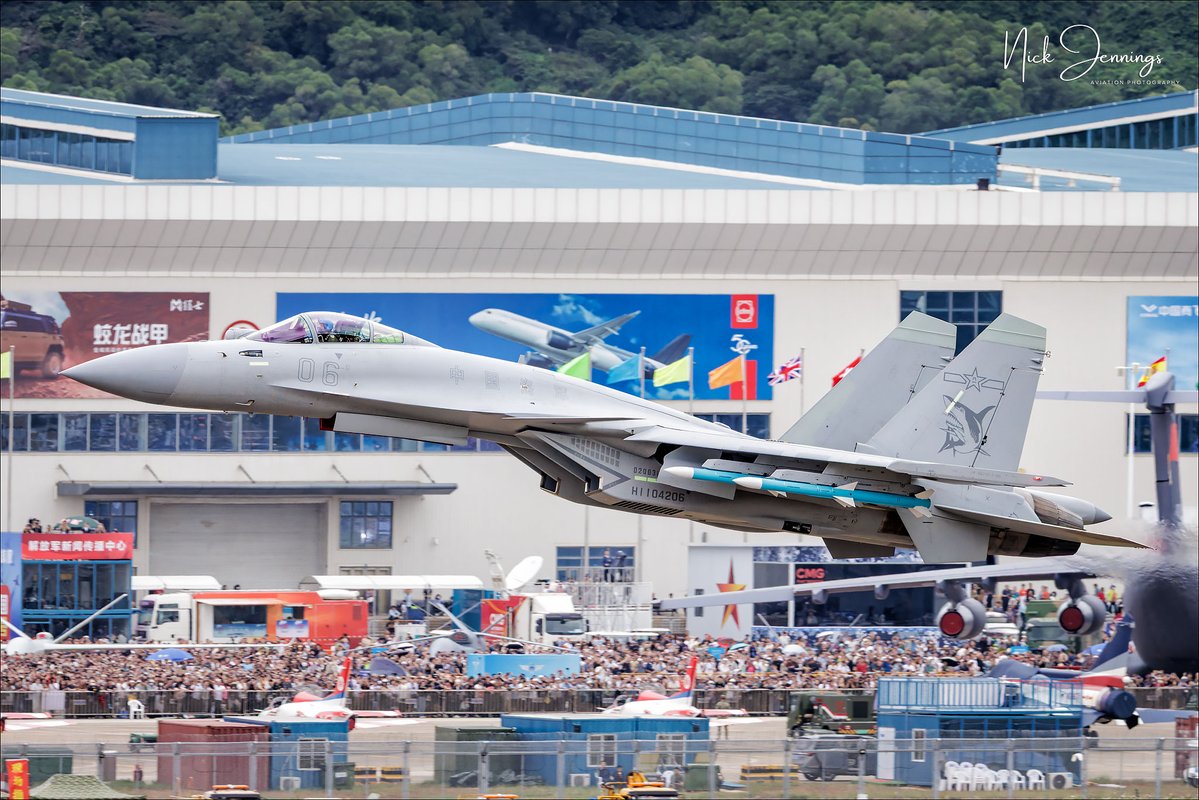 darealnjennings's tweet image. A closer shot of the naval Shenyang J-15T Feisha, with the flying shark logo on the tail. Seen here, performing a missed approach in front of the crowds at the Zhuhai show.
