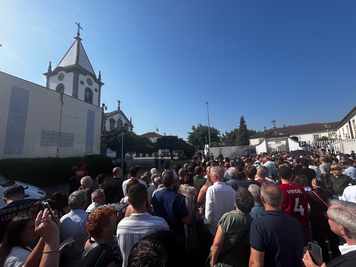 The courtyard of the church in Gondomar is now filling up with the service expected to start in 20 minutes time.

Some people are stood on walls to try and catch sight of some of those coming to pay their respects. 

A lot of young children have come with their parents.