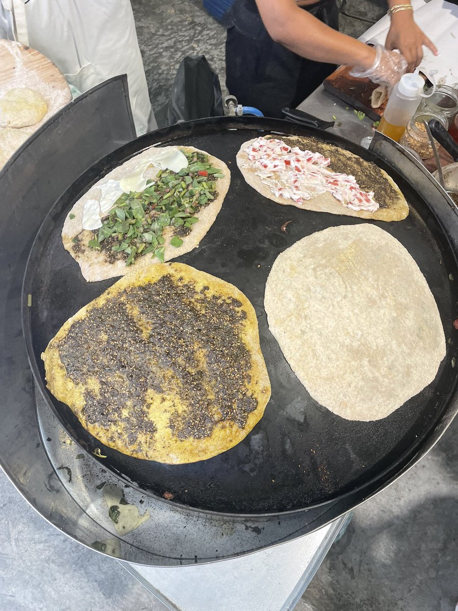 How does a Mar Mkhayel (Saint Michael) late breakfast look like?
West croissant meeting the east saj this morning; 
#Beirut, where East and West rise together… oven-fresh.
#beirutflavors #Beirutbreakfast #Beirut4ever