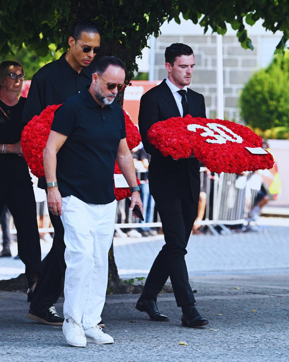 Liverpool players and staff, led by Virgil van Dijk and Andy Robertson, have arrived for the funeral of Diogo Jota and Andre Silva in Portugal on Saturday morning.

The floral tributes have number 20 and number 30, the two brothers' respective squad numbers.