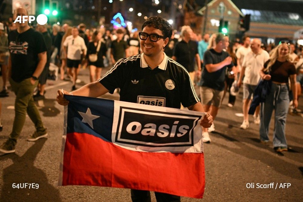 A fan of British rock band Oasis who came all the way from Chile outside the Principality Stadium in Cardiff on July 4, 2025, after attending the opening concert of their highly anticipated reunion tour