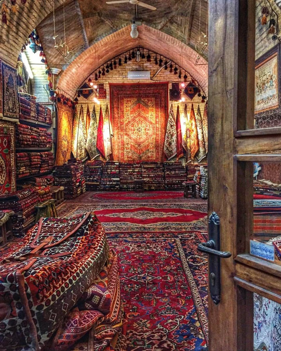 Carpets in a historic bazaar in Esfahan