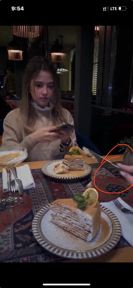 2 million people and no one noticed? I feel like a detective 🕵️‍♀️ Look at the nails that’s a woman next to her 💅