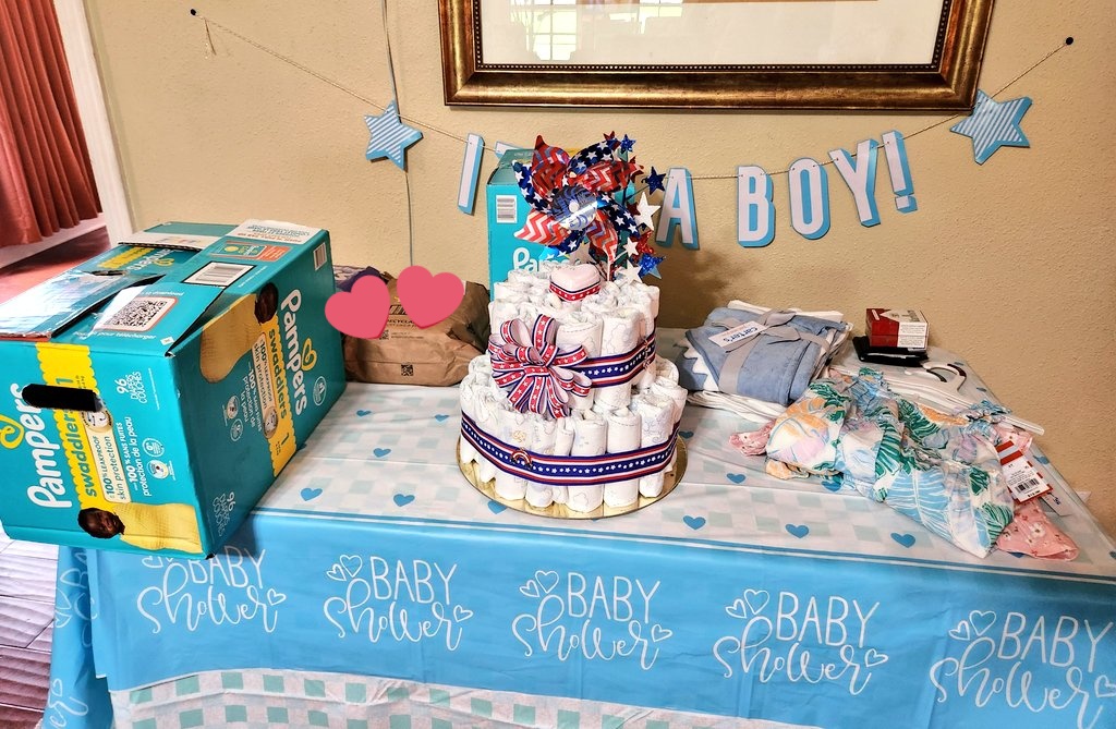 My very first attempt at a diaper cake!! Feeling really proud, but done with glue guns for a good bit! 😅