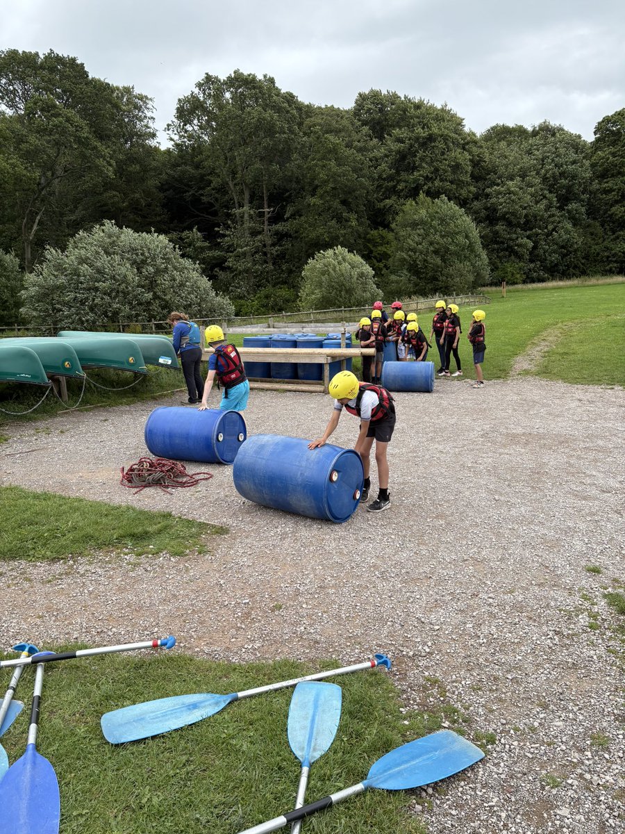 Group 1 having fun building a raft ready to get wet.
