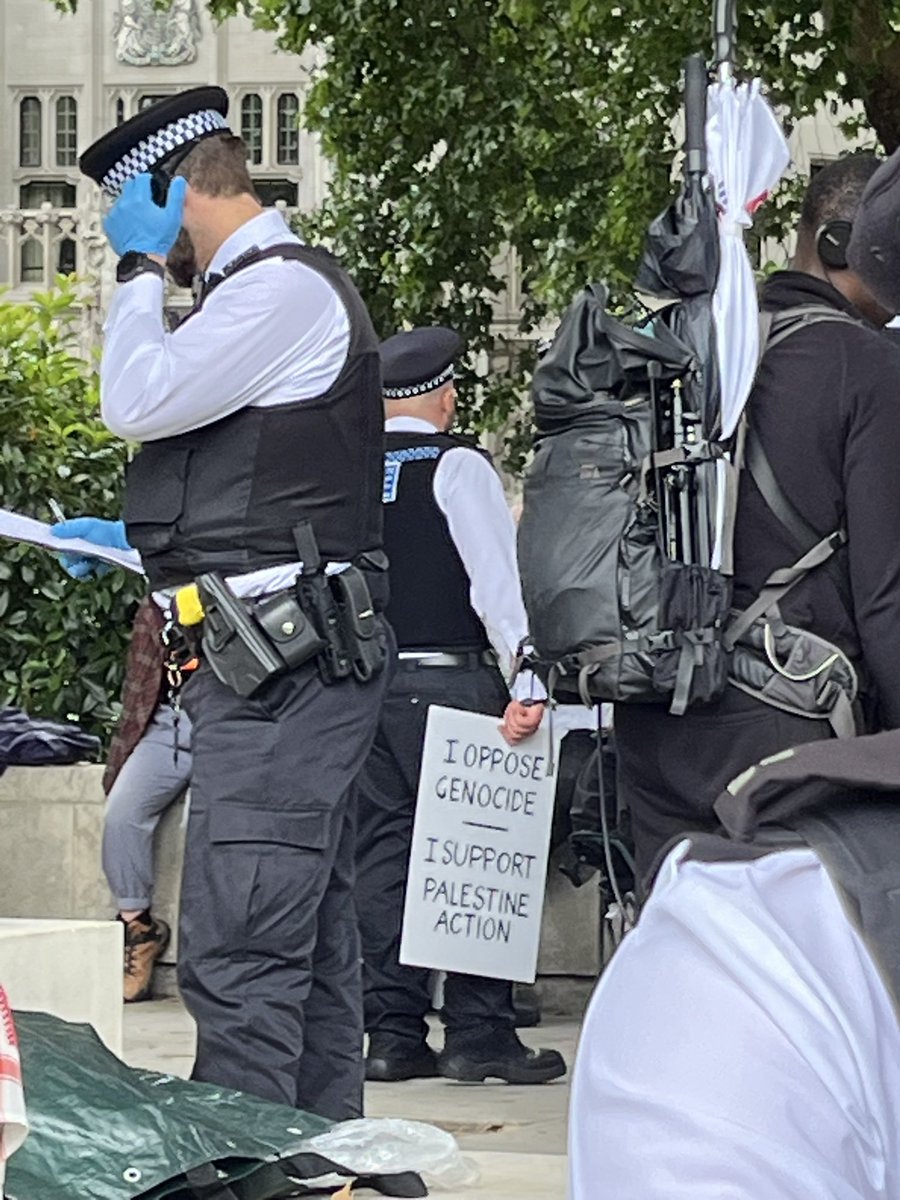 Katie McFadden (@katiemcfadden27) on Twitter photo Hi, <a href="/metpoliceuk/">Metropolitan Police</a> - I’d like to report a police officer committing an offence under section 13 of the Terrorism Act. Hi, <a href="/metpoliceuk/">Metropolitan Police</a> - I’d like to report a police officer committing an offence under section 13 of the Terrorism Act.