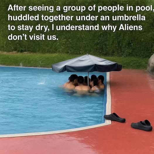 #ExtremelyStupidThingsToDo Making an attempt to stay dry, while in a pool.