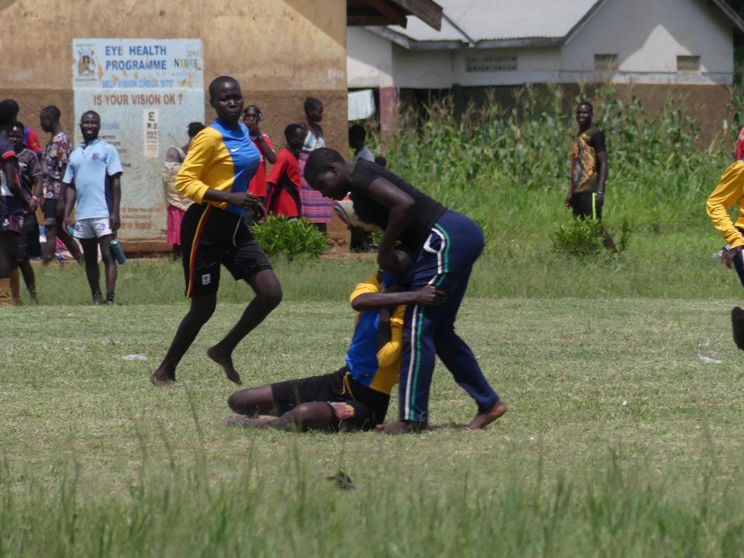 Action in the women's category of the RTL Community 7s at Lagot Cugu Primary School, Mucwini Subcounty, Kitgum District. 

#RugbyTacklingLife 
#RotisOnTheRoad