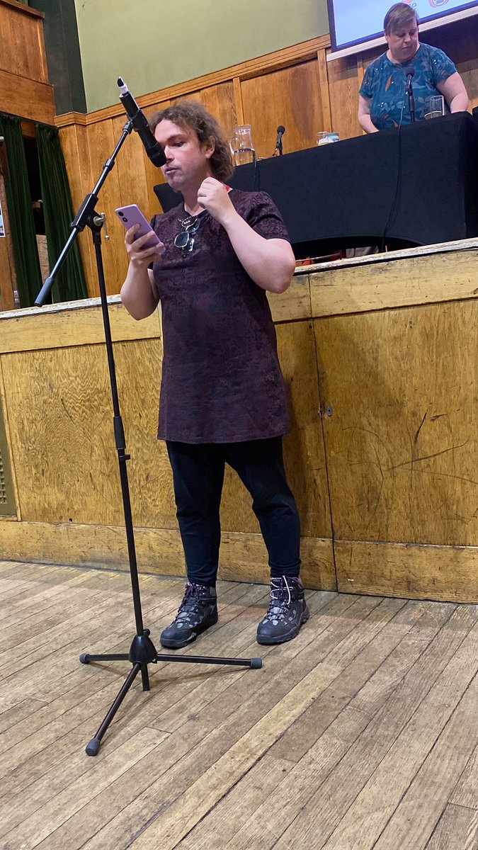 Sezla's tweet image. Eilonwy from PCS Proud speaking at #nssn2025 on the fight against the way bosses use the Supreme Court ruling - but also the struggle for trade unions to take up trans rights