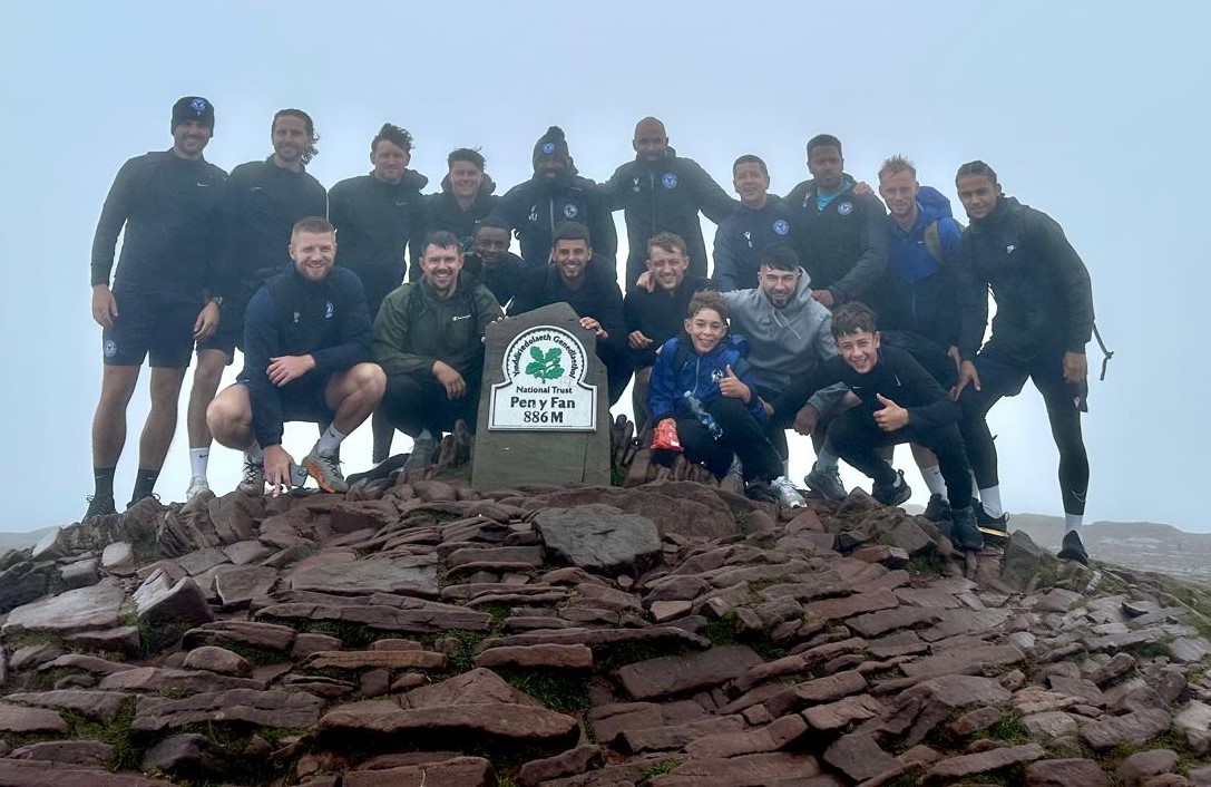 The Yate Town squad in tough wet and windy conditions were involved in a team bonding session today where they all climbed up Pen Y Fan.