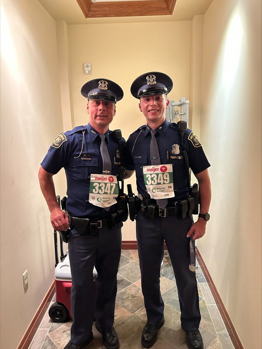 Troopers from the MSP Traverse City Post took first place out of 18 teams in the team portion of the Cherry Festival 5K race.  Troopers Sysko and DeCastro completed the race in full uniform. Great job, troops!!