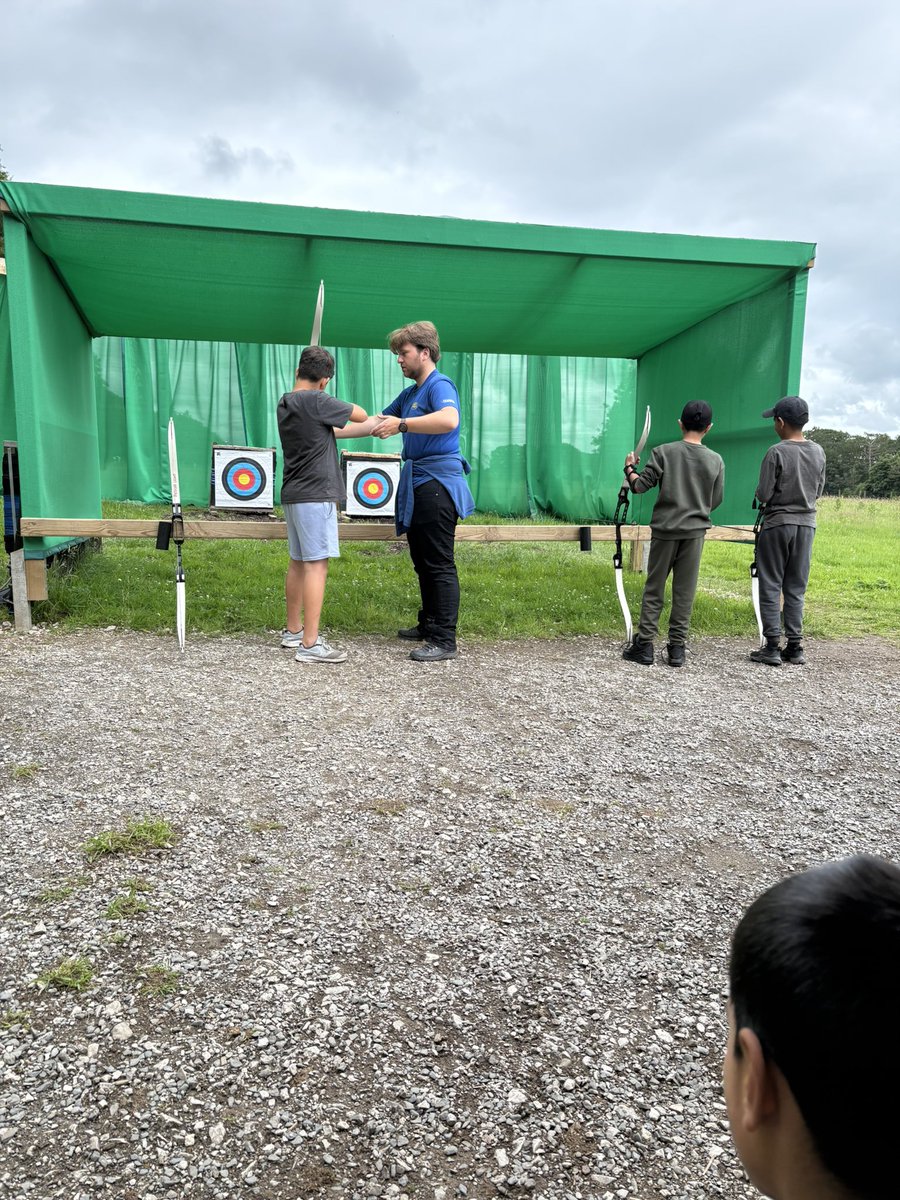 Group 1 loving archery.
