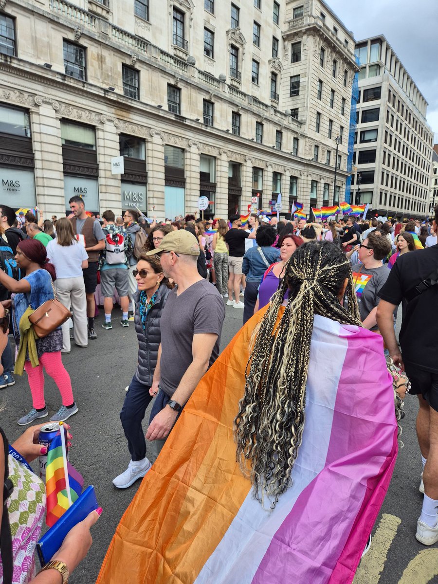 Apart from being difficult to cross Picadilly, and a man behind us wearing nothing but a string around his penis, it was a joyful parade and day. People were having fun. I don't believe that trans women are women, but I didn't care that other people do.