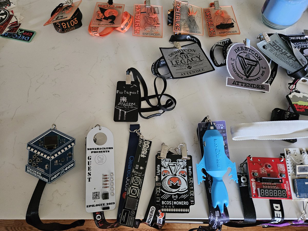attritionorg's tweet photo. The badges for the upcoming charity auctions are photographed and sorted! Next up, inventory w/ details then list them... #DEFCON #DerbyCon #ShmooCon #BadgeLife https://t.co/zUY5QYKwM6