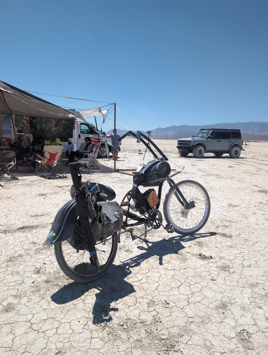 AlexLi98's tweet image. Found the coolest bike on the playa, built in sound system, lights, and a self defense rig!