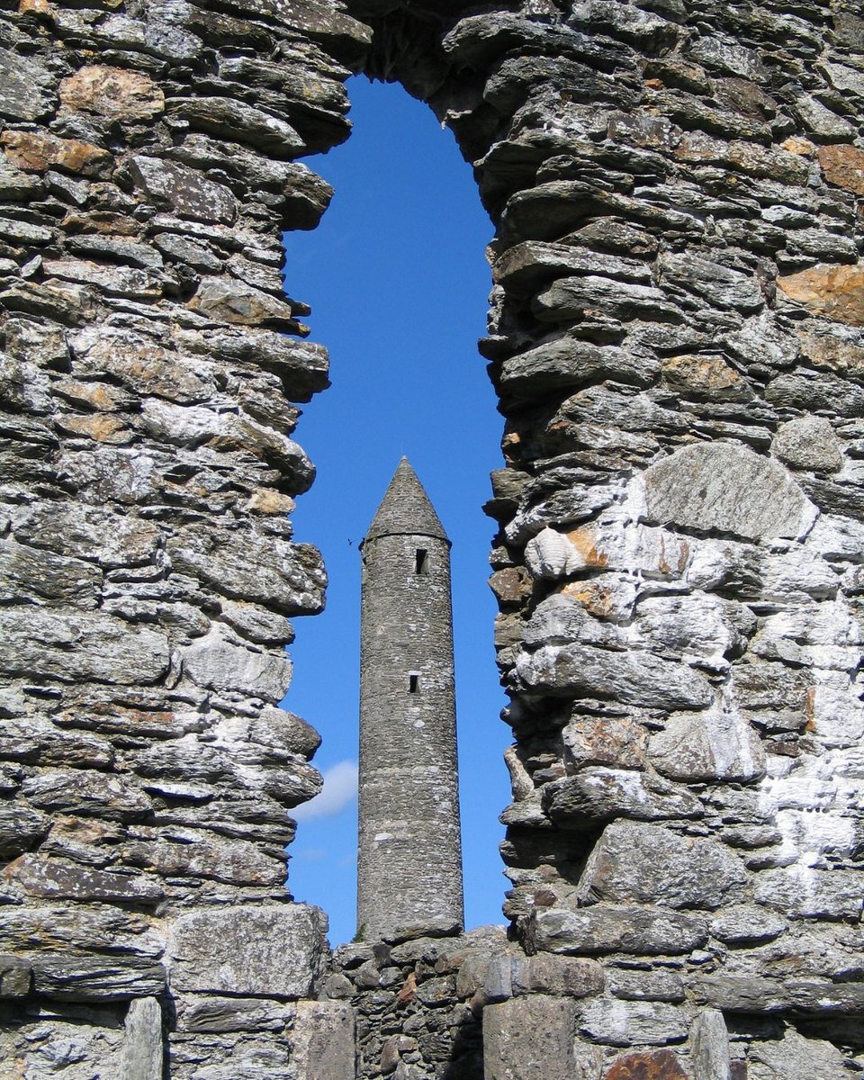 What was the purpose of the round towers?

Glendalough, Wicklow, Ireland