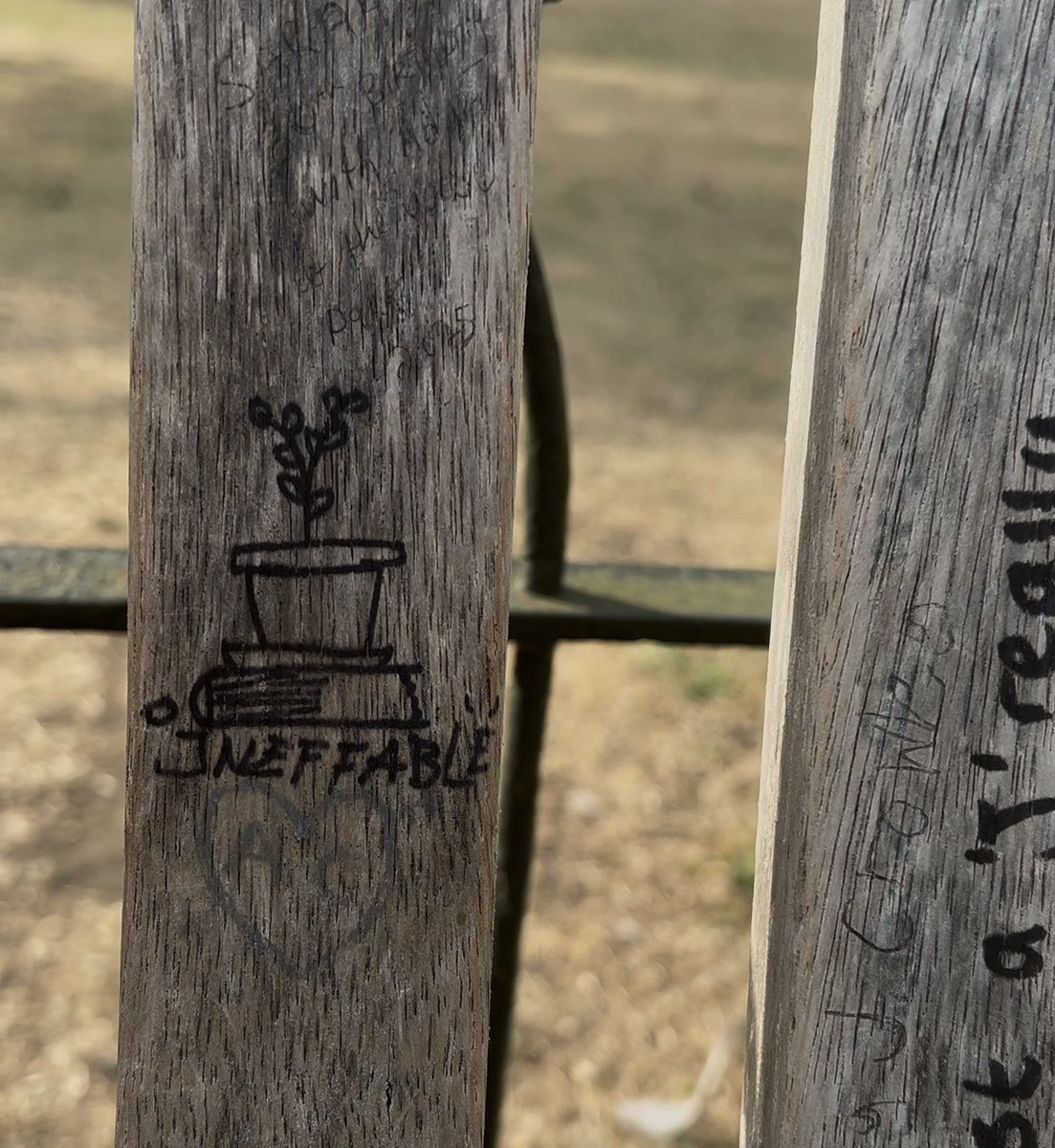 Some doodles on the Good Omens bench. It is so so so so full of quotes now.