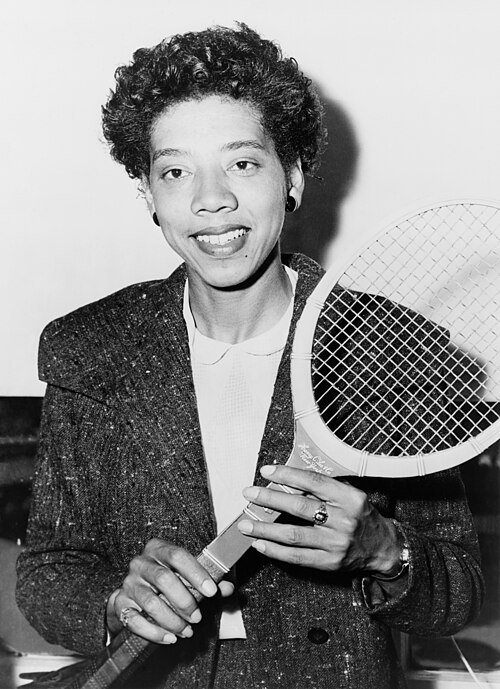 Woman of the Day tennis player and professional golfer Althea Gibson, born in 1927 in South Carolina, became the first black champion to win Wimbledon OTD in 1957 and the first Wimbledon champion ever to receive a trophy directly from Queen Elizabeth II.

"Shaking hands with the