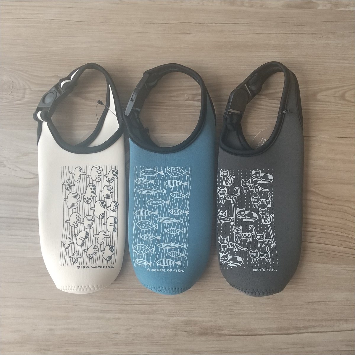 ちょっとシュールなアニマル柄のハンドル付きボトルカバーです