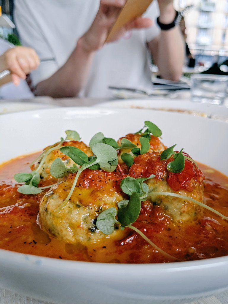 Gnudi in tomato brodo, spinach &amp; sheep's ricotta

Ragù, Bristol