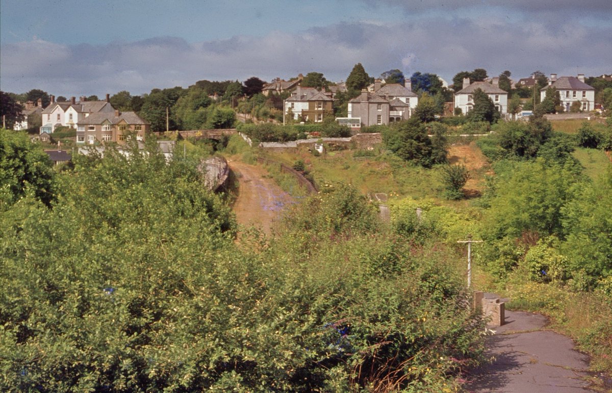 The view from the station footbridge at Tavistock in 1977 when the station house was called 'Beeching's Folly' On the bottom right is the end of the up platform ©railarchive.org.uk