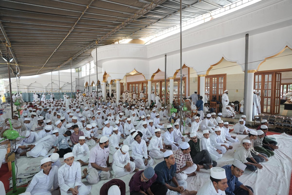 Spiritual fervor: Scenes from Ma'din Grand Masjid, where attendees of the Hijra Conference are deeply engaged in Adkar, a profound aspect of their Ashura's day observances, including the recitation of 1000 Surah Ikhlas.