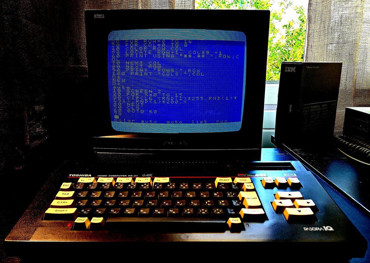 BASIC programming session with my MSX Pasopia IQ (Toshiba HX-21).
There are 2 different programs on screen: guess what they do when you hit RUN