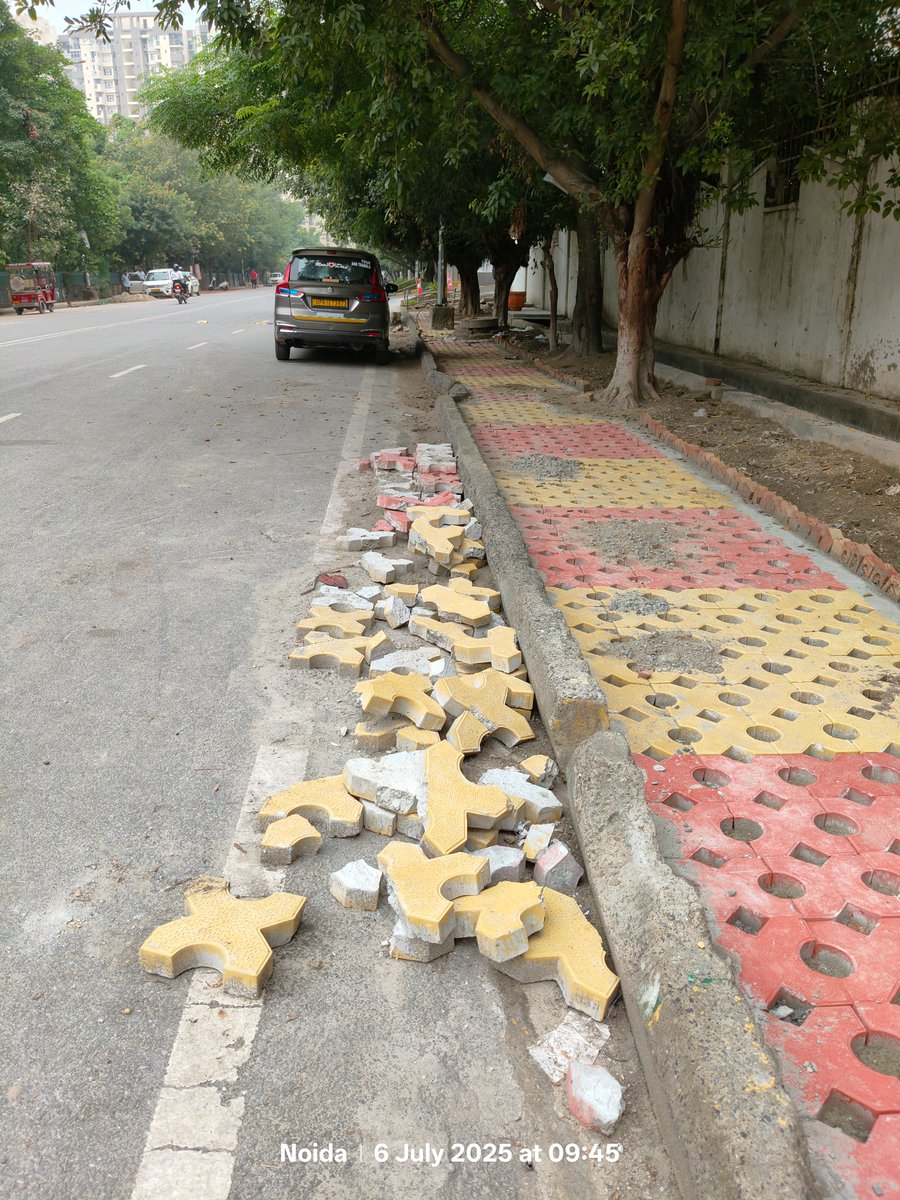 <a href="/CeoNoida/">CEO, NOIDA Authority</a> 
<a href="/noida_authority/">NOIDA Authority</a> 
<a href="/InduPrakashPCS/">Indu Prakash Singh</a> 

Noida sector 137 me paving tiles laga kar kude ki tarah roadside par fenk di gayi hain. #Swachhnoida