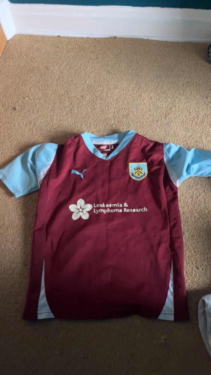 going through my old clothes and look how adorable my old burnley shirt is