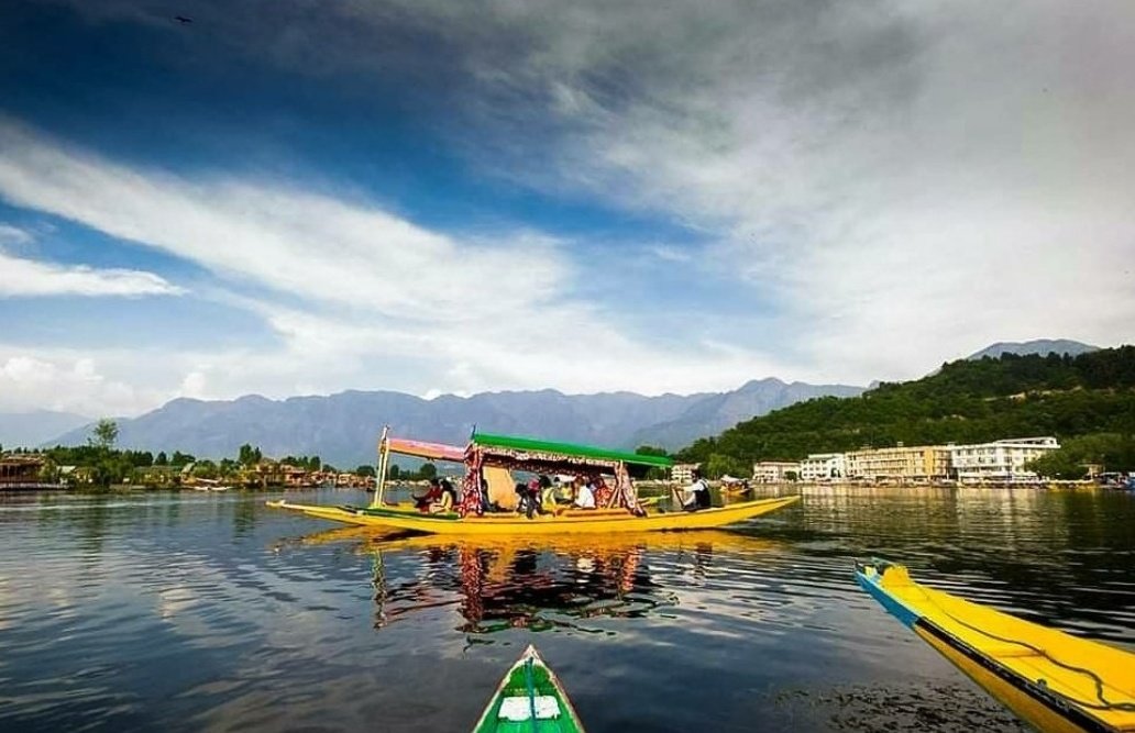 The daylight rests on Dal Lake's skin
In stillness deep,the world grows thin
A shikara glides,both slow &amp; sure
In #silence pure,the #Soul feels cure
Mountains stand like timeless grace
While silence hums in every place

#vss365
#NatureLovers
#theme_pic_India_layers
#poetry #life