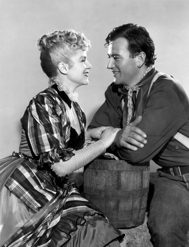 Please name one Western you would recommend to someone who is completely new to the genre. For me, my mind immediately says, “Which John Ford western do I recommend first?!” Often it’s Stagecoach.

Claire Trevor and John Wayne, Stagecoach (1939, directed by John Ford)