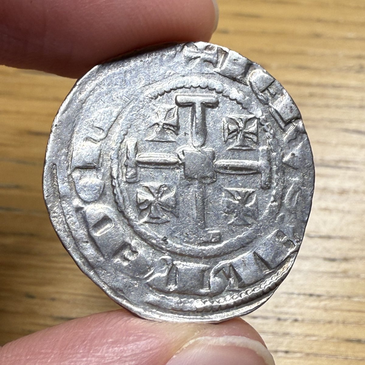 The Jerusalem cross appears on this silver coin of the Kingdom of Cyprus that was minted sometime between 1324 &amp; 1359 during the reign of King Hugh IV, nephew of the last king of Jerusalem. The kings of Cyprus continued to claim the Kingdom of Jerusalem after it fell in 1291.