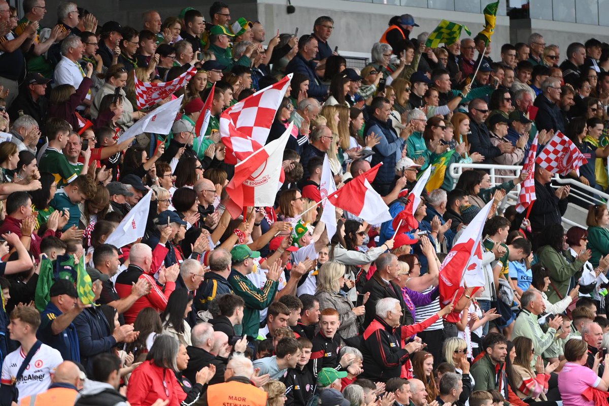 Tyrone supporters pictured in Newbridge this afternoon at the All-Ireland minor final against Kerry. Photographs by Mickey Cullen