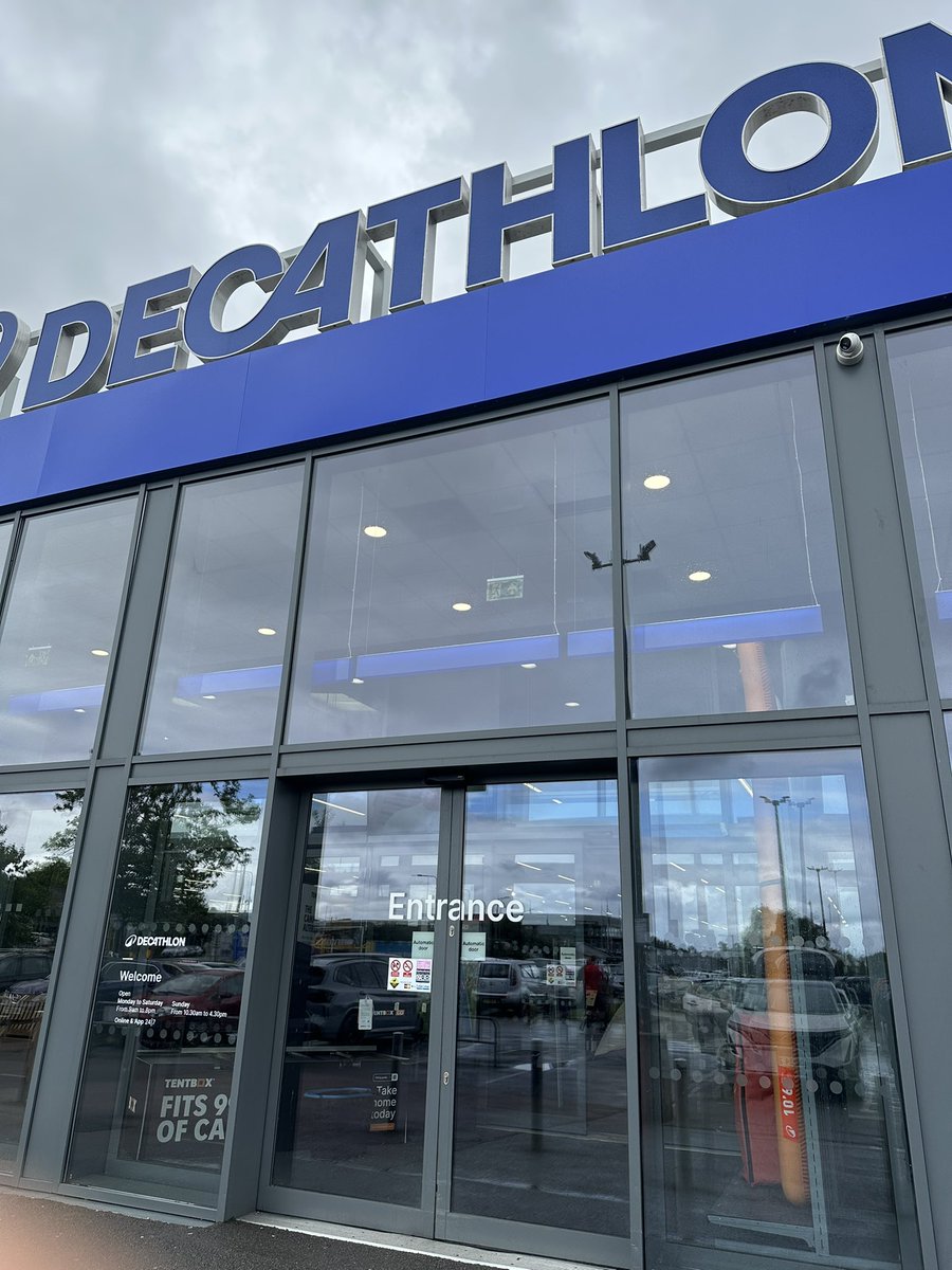 simonwest321's tweet photo. @DecathlonUK hey decathlon.. your website says you are dog friendly and allow them in. Your Stockport store has a ‘no dogs’ sticker on the door. Lots of people were outside with their dogs in the pouring rain thinking you won’t let them in… yet your website says they can!? https://t.co/Knat60RT4m