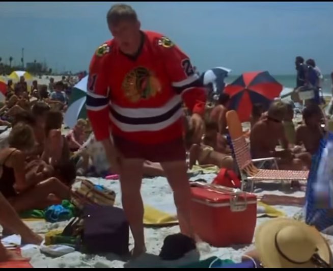 John Candy wearing a Stan Mikita jersey in Summer Rental.
