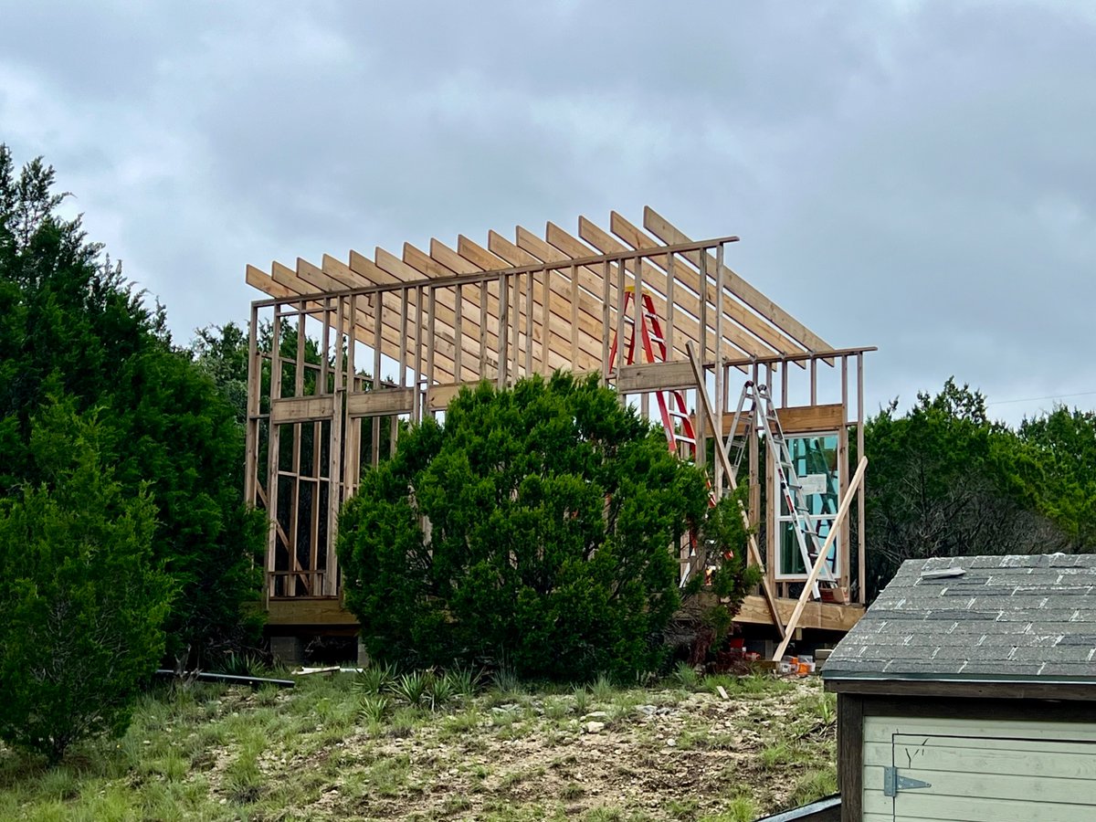 Worked on the rafters to get my mind off the river cabin. Made solid progress yesterday and today. 

Ran out of nails but next stop is sheathing