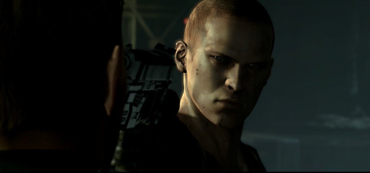 RacconSurvivor's tweet image. A clever subtle nod to Wesker in RE6 is how Jake's action parallels what his father always did to Chris, aiming a gun point-blank at his face with neither of them intending to kill him with it, while Jake does lose his cool, he still deliberately shoots off target. #REBHFun