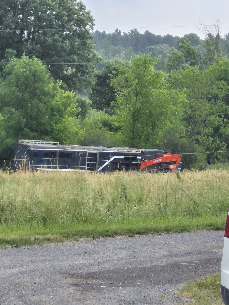 Traveling down our road you see it all. I guess it doesn't matter which way it's going but the skidsteer is in reverse...... #horsepeople