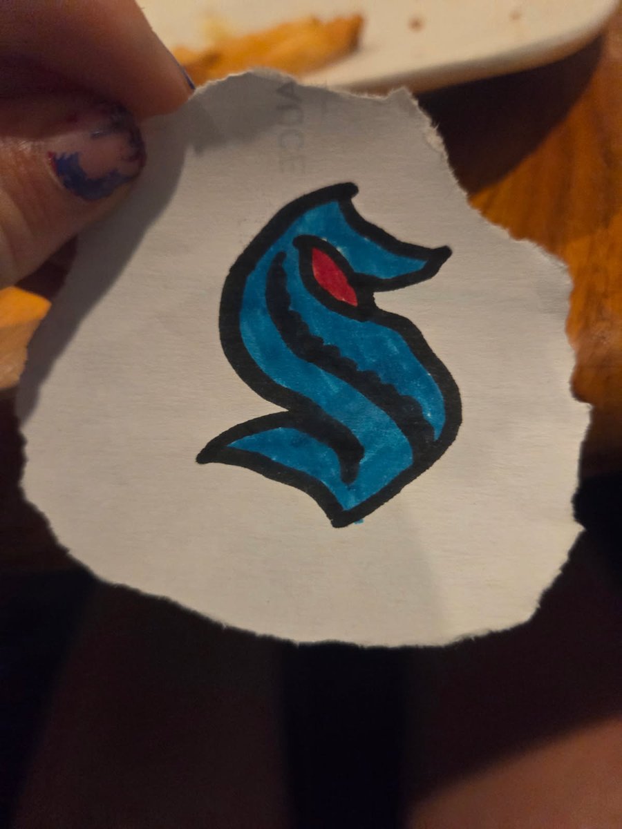 Ryan Gladwin (@rcgladwin64) on Twitter photo My wife sent me this: Cathryn drawing at the restaurant down in Florida. Girl drew a pretty sweet <a href="/SeattleKraken/">Seattle Kraken</a> logo! She loves the Kraken! #hockeygirl <a href="/SeattleKrakenPR/">Seattle Kraken PR</a> <a href="/KrakenTeamStore/">Seattle Kraken Team Store</a> My wife sent me this: Cathryn drawing at the restaurant down in Florida. Girl drew a pretty sweet <a href="/SeattleKraken/">Seattle Kraken</a> logo! She loves the Kraken! #hockeygirl <a href="/SeattleKrakenPR/">Seattle Kraken PR</a> <a href="/KrakenTeamStore/">Seattle Kraken Team Store</a>