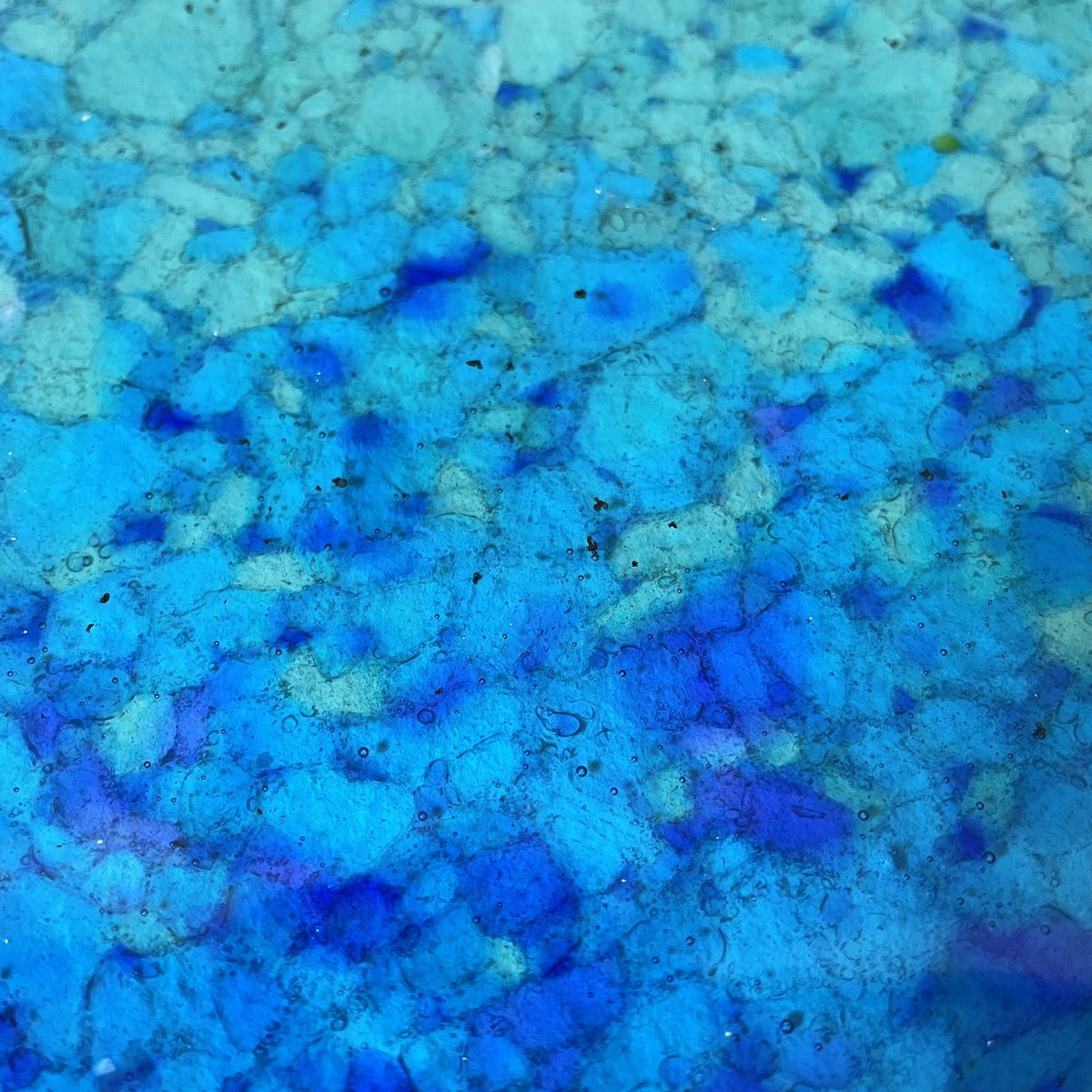 So the ‘gemstones’ from yesterday fired overnight and have emerged from the kiln as a new sheet of glass!🤩🤩🤩
 It reminds me of when I was a textile student and working with batik, these colours are just wow 🤩
Anyway, a fresh dilemma…..! Is it too nice to cut up? 🤔 #glassart