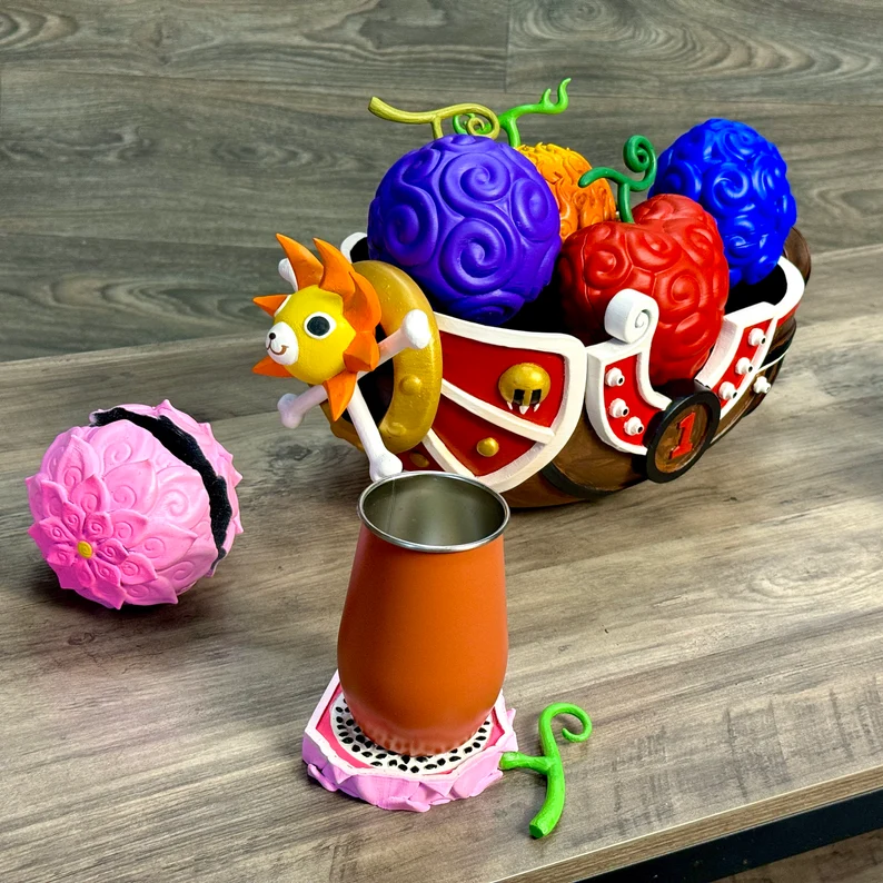 toastermrvl's tweet photo. @OPMerchandise Yeah! And behind it is a map of the One Piece world carved into wood

The devil fruits are actually coasters - this one Etsy person @Senpai3D has TONS of Fruit options: https://t.co/U8NIuGYXQd

(ultimate stuff for OP collectors) https://t.co/xhPlQzxj80
