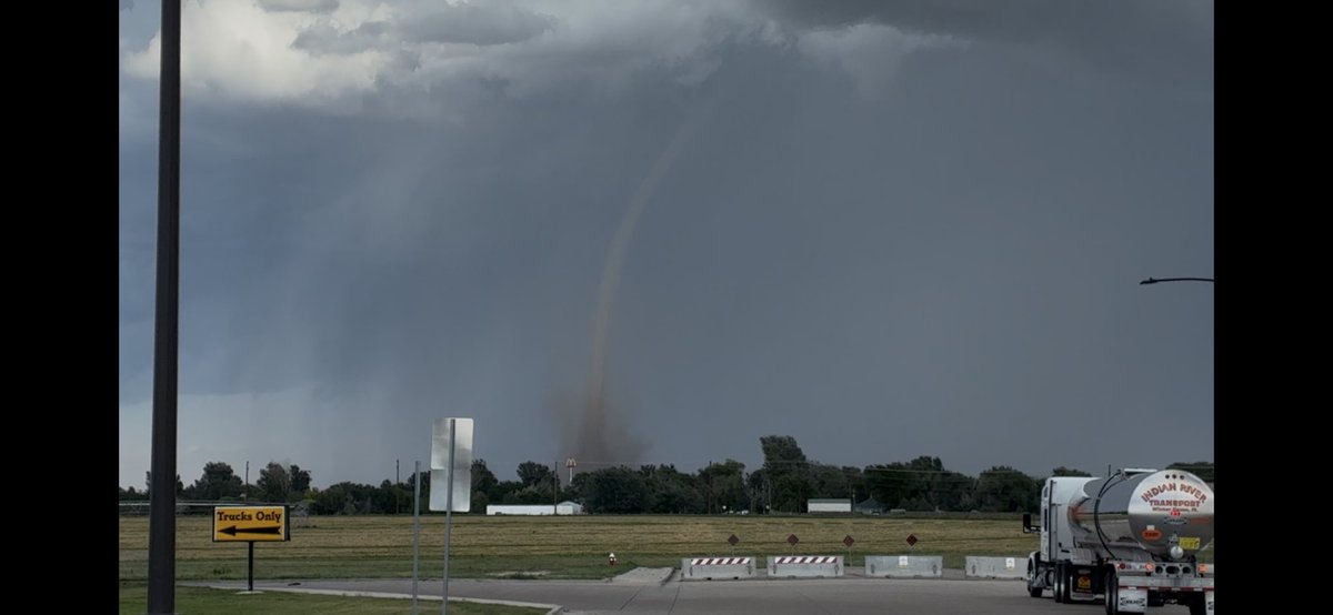 Beautiful landspout just east of Brush! Screenshot of my video from the <a href="/LovesTravelStop/">Love's Travel Stops</a> parking lot!