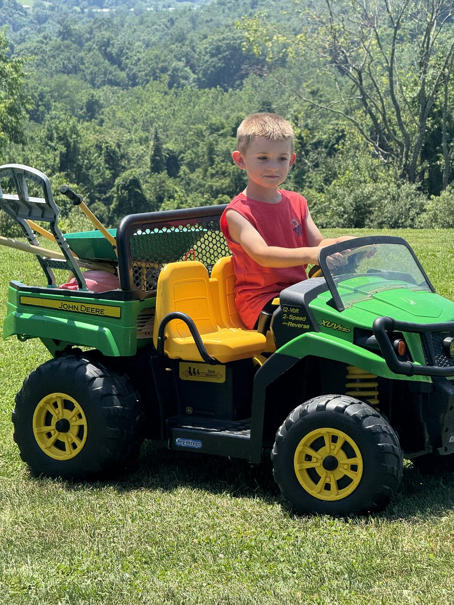 Hard at work and always on the move! Raking, loading up the Gator, and ready to take on the backyard like a pro! 💪🚜☀️ #YardBoss #FutureFarmer