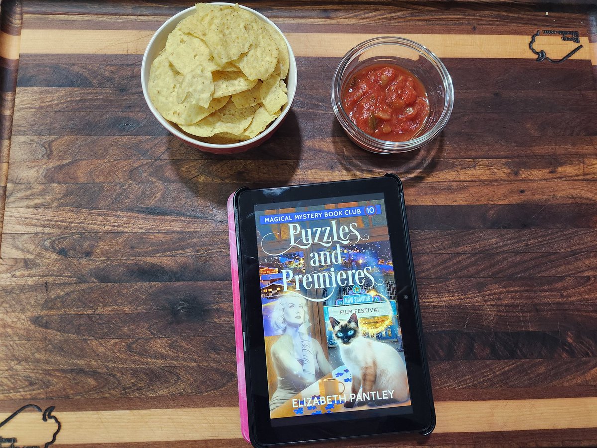 I am #currentlyreading PUZZLES AND PREMIERES by Elizabeth Pantley.