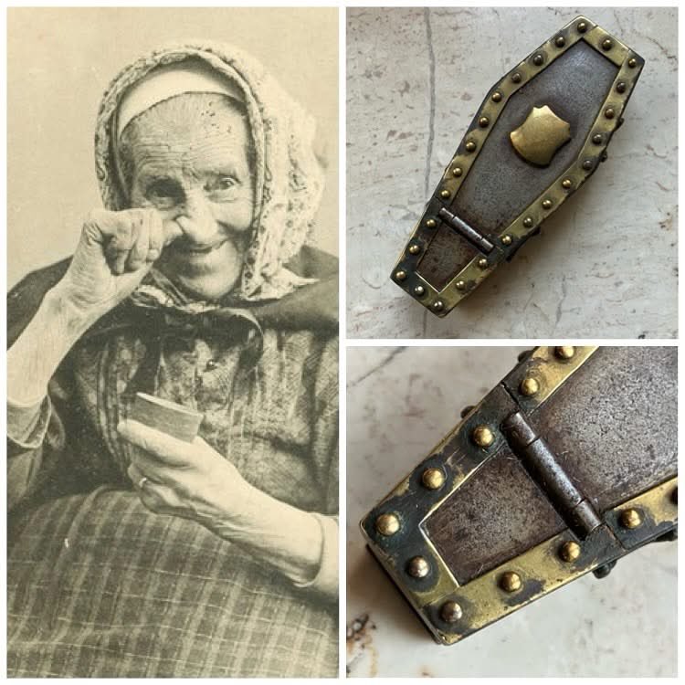 This snuff box is a fascinating piece shaped like an iron coffin, likely dating back to the late 1800s or early 1900s. Its design is both unusual and striking, showcasing fine craftsmanship and attention to detail. Despite its age, the box is in very good condition, with only the