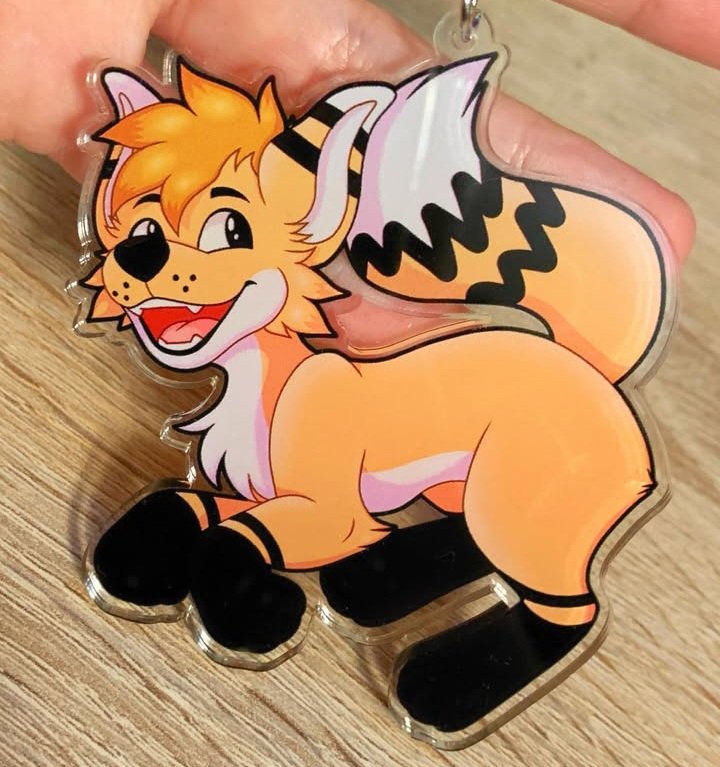 I found out at something this charm fell off my backpack. Most likely somewhere near the roof access at #anthrocon if anyone finds it please let me know.