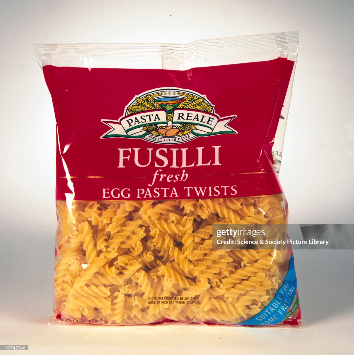 Pasta is produced in a small commercial fresh pasta machine using an extrusion die. The machine mixes and kneads the raw materials to form a dough. The dough is pushed through the die, with the holes in the die forcing the dough to twist out naturally under high pressure (2000)