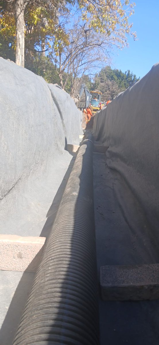 The JRA team is installing subsurface drainage pipes to address the problem of underground water on Apiesdoring Street in Sundowner, Region C 🚧

These pipes collect excess water from underground and convey it to a designated surface drain, protecting roads and other structures.
